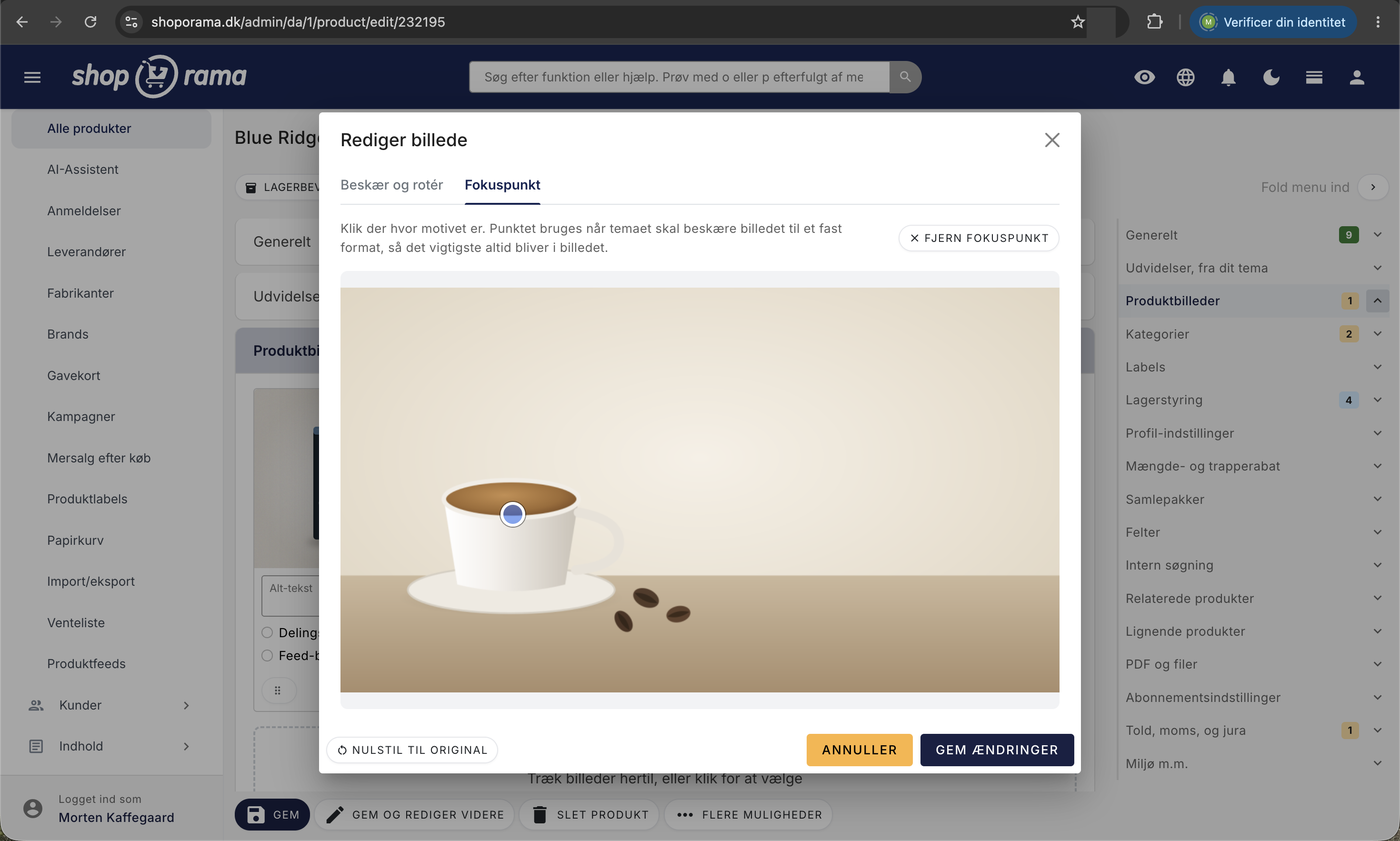 Fanen Fokuspunkt med et bredt billede hvor kaffekoppen står i venstre side, og en blå prik sat midt på koppen
